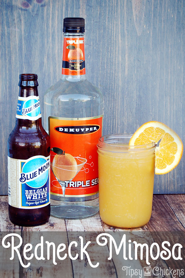 Blue Moon beer, Triple Sec and orange juice in a mason jar with an orange slice