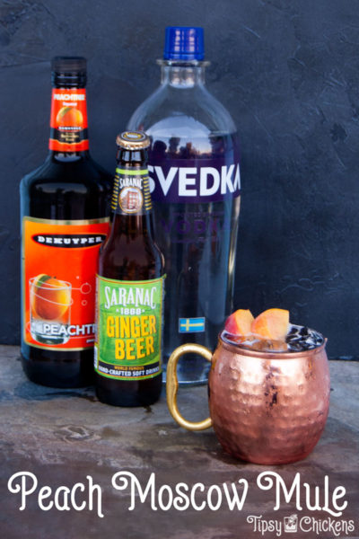 Enjoy a sweet and spicy Peach Moscow Mule, this variation on the perennial favorite is filled with fresh peach flavor and a kick from schnapps and vodka #summercocktail #moscowmule #summermule #peachcocktail #gingerbeer #tipsychickens