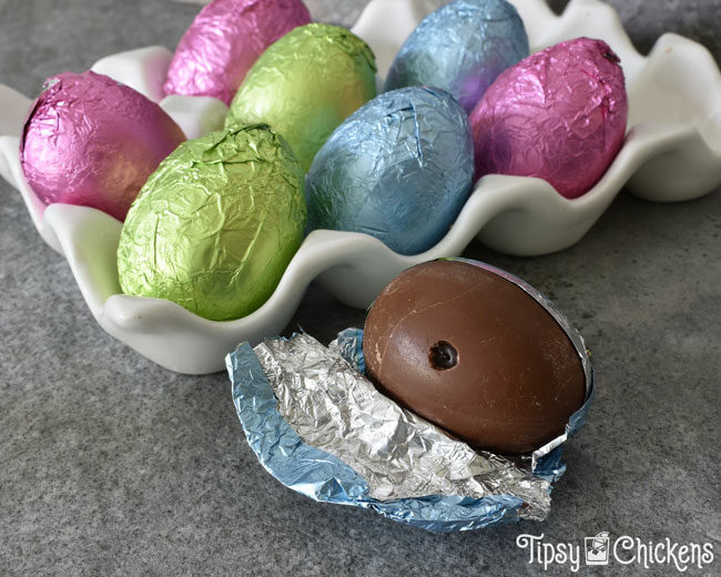 small hole in a hollow chocolate Easter egg filled with chocolate ganache made with RumChata