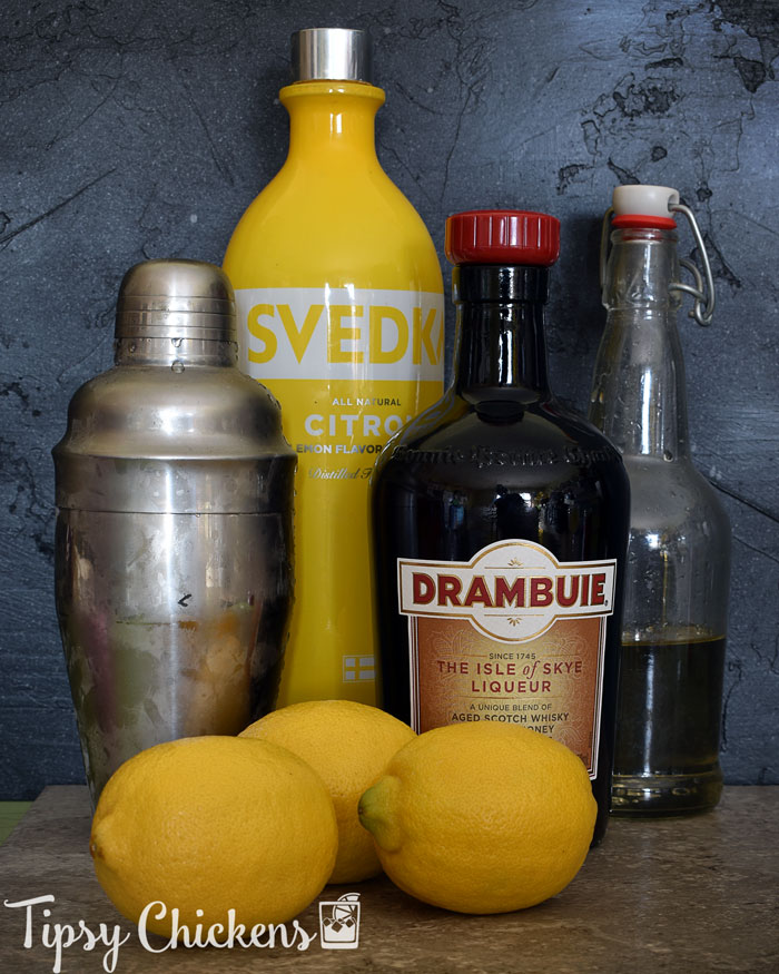 lemon meadow cocktail ingredients citron lemon vodka, Drambuie, lemons, simple syrup in a flip top bottle and a silver cocktail shaker